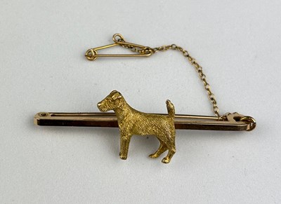 Lot 14 - A 15CT GOLD FOX TERRIER BAR BROOCH,

Marked...