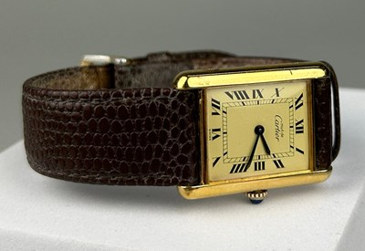 Lot 45 - VINTAGE CARTIER: A LADIES MUST DE CARTIER...