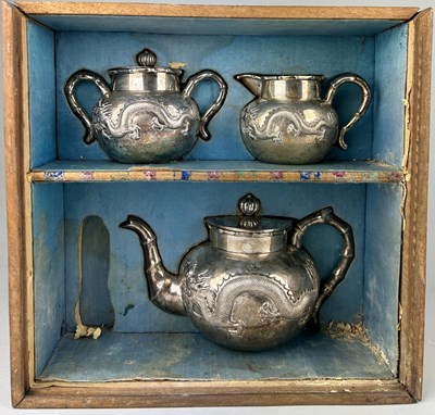 Lot 63 - A CHINESE EXPORT SILVER TEA SET WITH FOUR...