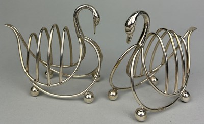 Lot 79 - A PAIR SILVER TOAST RACKS IN THE FORM OF SWANS...