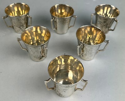 Lot 86 - A SET OF SIX SILVER STIRRUP CUPS, 

Weight 169gms