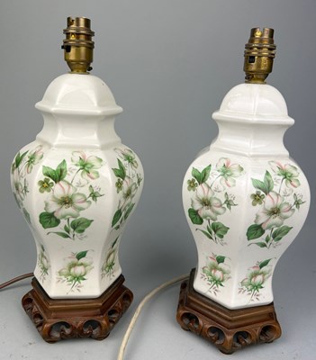 Lot 295 - A PAIR OF FLORAL SIX PANEL BALUSTER VASE TABLE...