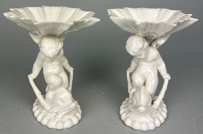 Lot 357 - A PAIR BLANC DE CHINE DISHES OF CUPID RIDING A...