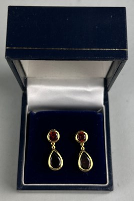 Lot 42 - A PAIR OF RED GARNET AND 18CT GOLD EARRINGS...