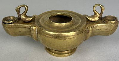 Lot 132 - A GRAND TOUR BRASS OIL LAMP