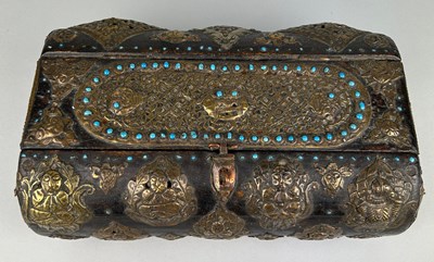 Lot 174 - A LARGE AFRICAN WOODEN AND HAMMERED BRASS BOX...