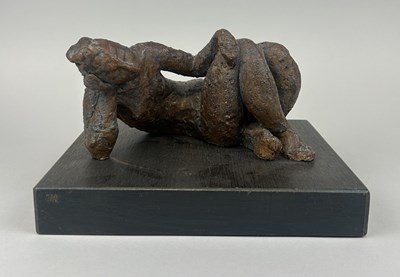 Lot 308 - A PATINATED BRONZE SCULPTURE OF A RECLINING LADY