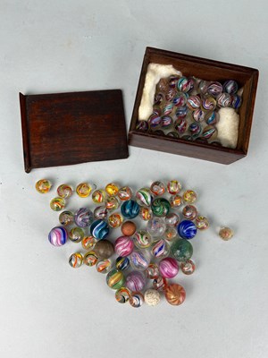 Lot 222 - A COLLECTION OF ANTIQUE GLASS MARBLES SOME...