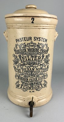 Lot 238 - A GLAZED STONEWARE WATER FILTER MANUFACTURED...