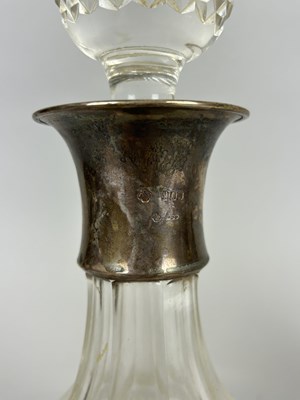 Lot 18 - A PAIR OF SILVER COLLAR DECANTERS