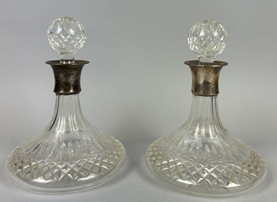 Lot 18 - A PAIR OF SILVER COLLAR DECANTERS