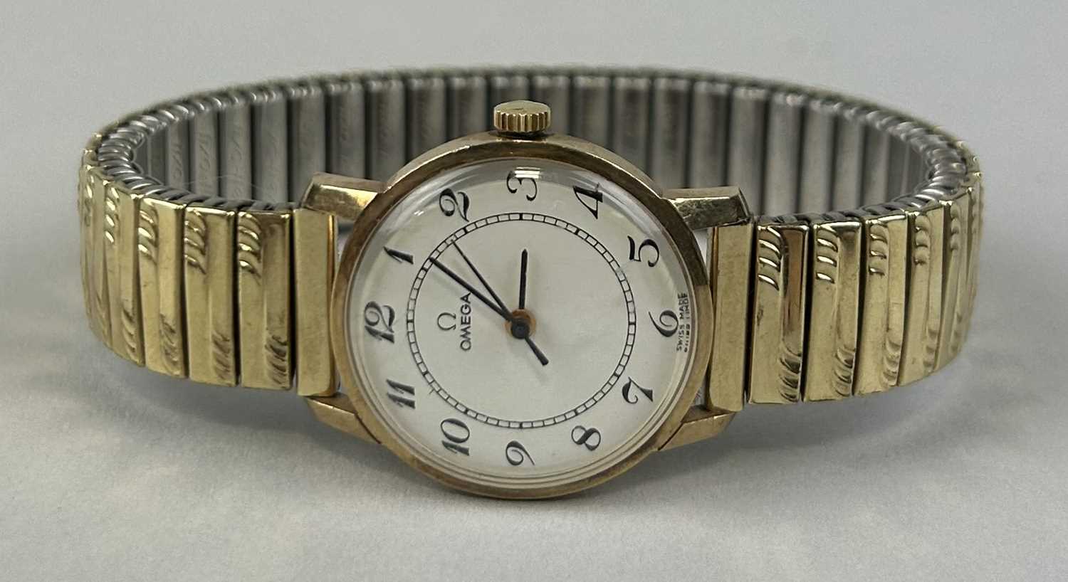 Lot 63 - A 9CT GOLD OMEGA LADIES WRISTWATCH