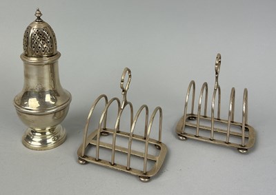 Lot 12 - A PAIR OF SILVER TOAST RACKS MARKED FOR HARRODS ALONG WITH A SUGAR SHAKER