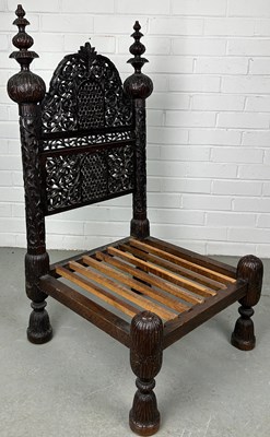 Lot 470 - A 19TH CENTURY INDIAN PIDDHA CHAIR, 

Heavily...