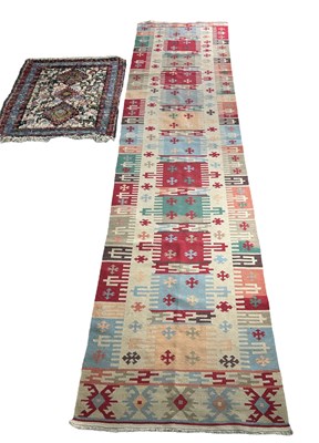 Lot 558 - A LONG KILIM RUNNER AND ANOTHER SMALL RUG (2)...