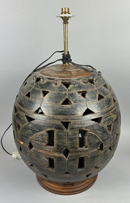 Lot 614 - A LARGE TERRACOTTA RETICULATED LAMP