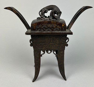 Lot 4 - A LATE 19TH CENTURY BRONZE CENSER OF ARCHAIC...