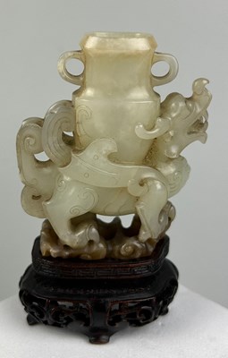 Lot 36 - AN 18TH CENTURY CHINESE JADE WINGED DRAGON...