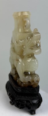 Lot 36 - AN 18TH CENTURY CHINESE JADE WINGED DRAGON...