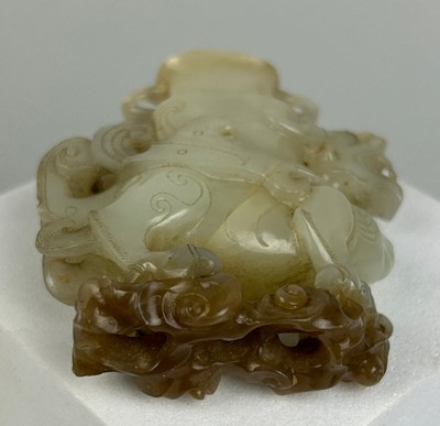 Lot 36 - AN 18TH CENTURY CHINESE JADE WINGED DRAGON...