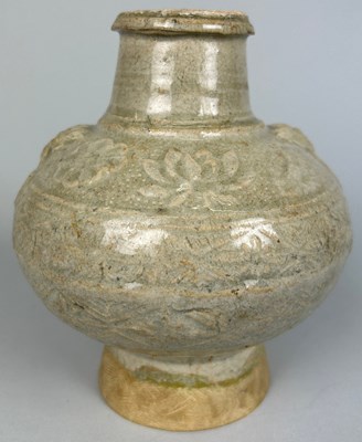 Lot 47 - A CHINESE MING DYNASTY OR EARLIER CELADON...