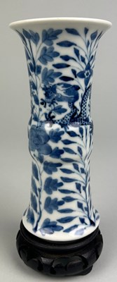 Lot 64 - A CHINESE BLUE AND WHITE VASE OF GU FORM,...