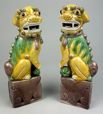 Lot 110A - A PAIR OF SANCAI GLAZED FOO DOGS, 

25cm x 9cm