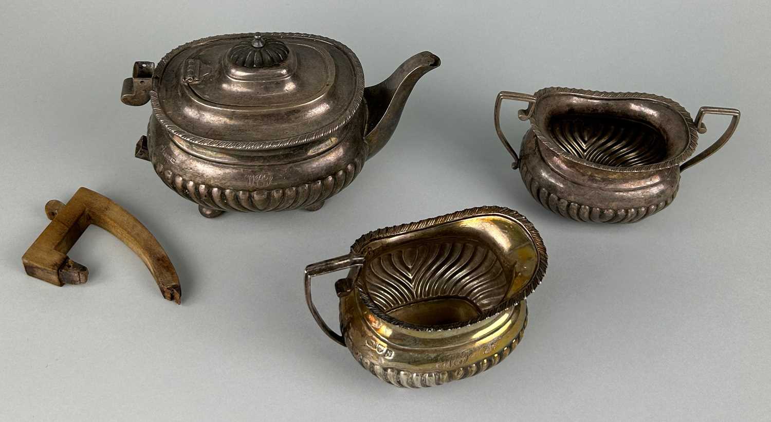 Lot 141 - A SILVER TEA POT MILK JUG AND SUGAR BOWL,...