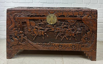 Lot 700 - A LARGE HEAVILY CARVED CHINESE CAMPHOR WOOD CHEST OR TRUNK