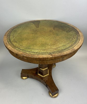 Lot 698 - A REGENCY CIRCULAR OCCASIONAL TABLE WITH TOOLED GREEN LEATHER TOP