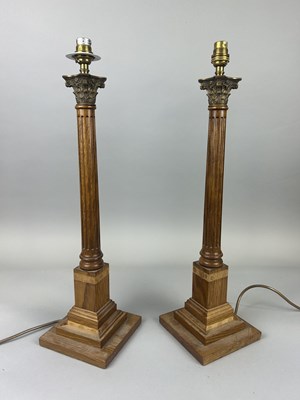 Lot 717 - A PAIR OF GRAND TOUR DESIGN WOODEN CORINTHIUM COLUMN LAMPS