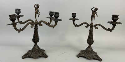 Lot 990 - A NEAR PAIR OF BRONZE TABLE LAMPS WITH CUPID FINIALS