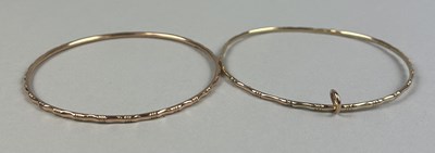 Lot 18 - TWO CHINESE GOLD BANGLES MARKED 14K