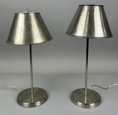 Lot 706 - A PAIR OF DESIGNER SILVER LAMPS