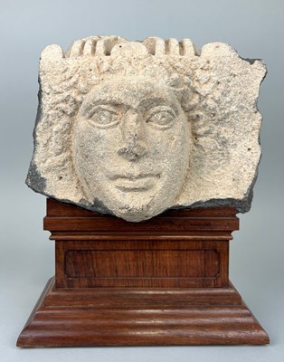 Lot 4 - AN EAST ROMAN 'HAURAN' BASALT RELIEF FRAGMENT...