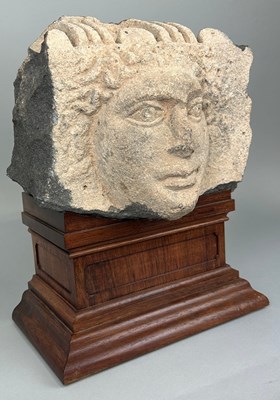 Lot 4 - AN EAST ROMAN 'HAURAN' BASALT RELIEF FRAGMENT...