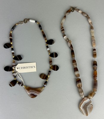 Lot 12 - A WESTERN ASIATIC BANDED AGATE BEAD NECKLACE...