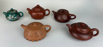 Lot 41 - A COLLECTION OF CHINESE YIXING CLAY TEA POTS...