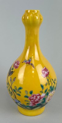 Lot 42 - A CHINESE YELLOW GLAZED BOTTLE VASE PAINTED...