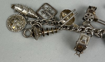 Lot 187 - TWO CHINESE SILVER CHARM BRACELETS