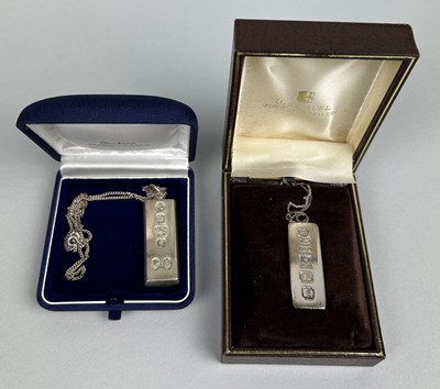 Lot 200 - TWO SILVER INGOTS WITH SILVER CHAINS