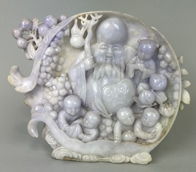 Lot 96 - A CHINESE JADE GROUP DEPICTING A LUOHAN WITH...