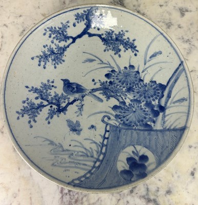 Lot 112 - A LARGE JAPANESE BLUE AND WHITE PLATE...