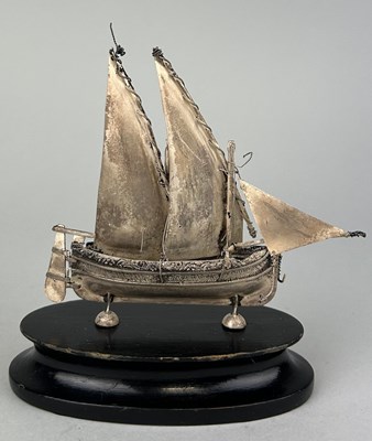 Lot 152 - A SILVER JUNK SHIP MOUNTED ON STAND, 

12cm x...