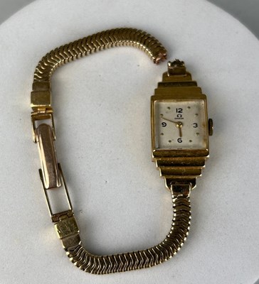 Lot 183 - AN OMEGA GOLD LADIES WRISTWATCH,

Weight 26gms