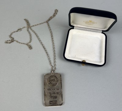 Lot 221 - A SILVER INGOT ON CHAIN