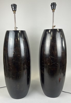 Lot 713 - A PAIR OF DESIGNER DARK WOOD TABLE LAMPS