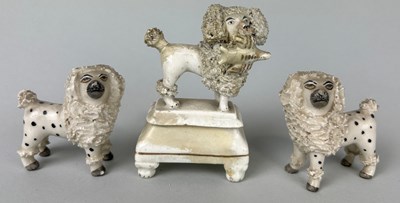 Lot 36 - A GROUP OF THREE CERAMIC DOGS POSSIBLY...