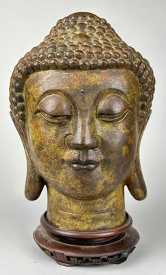 Lot 63 - A BRONZE HEAD OF BUDDHA, 

26cm H 

With...