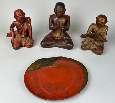 Lot 64 - A GROUP OF THREE CARVED WOODEN BUDDHA'S ALONG...